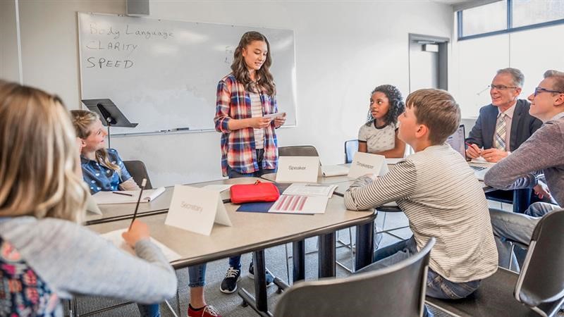 students debating at school