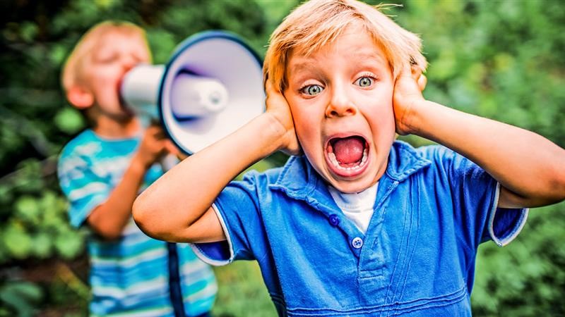 kids sharing the best school education advice from around world on a mega phone