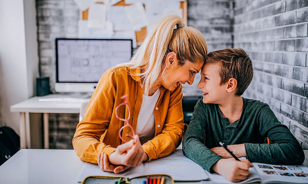 parent supporting child learning at home